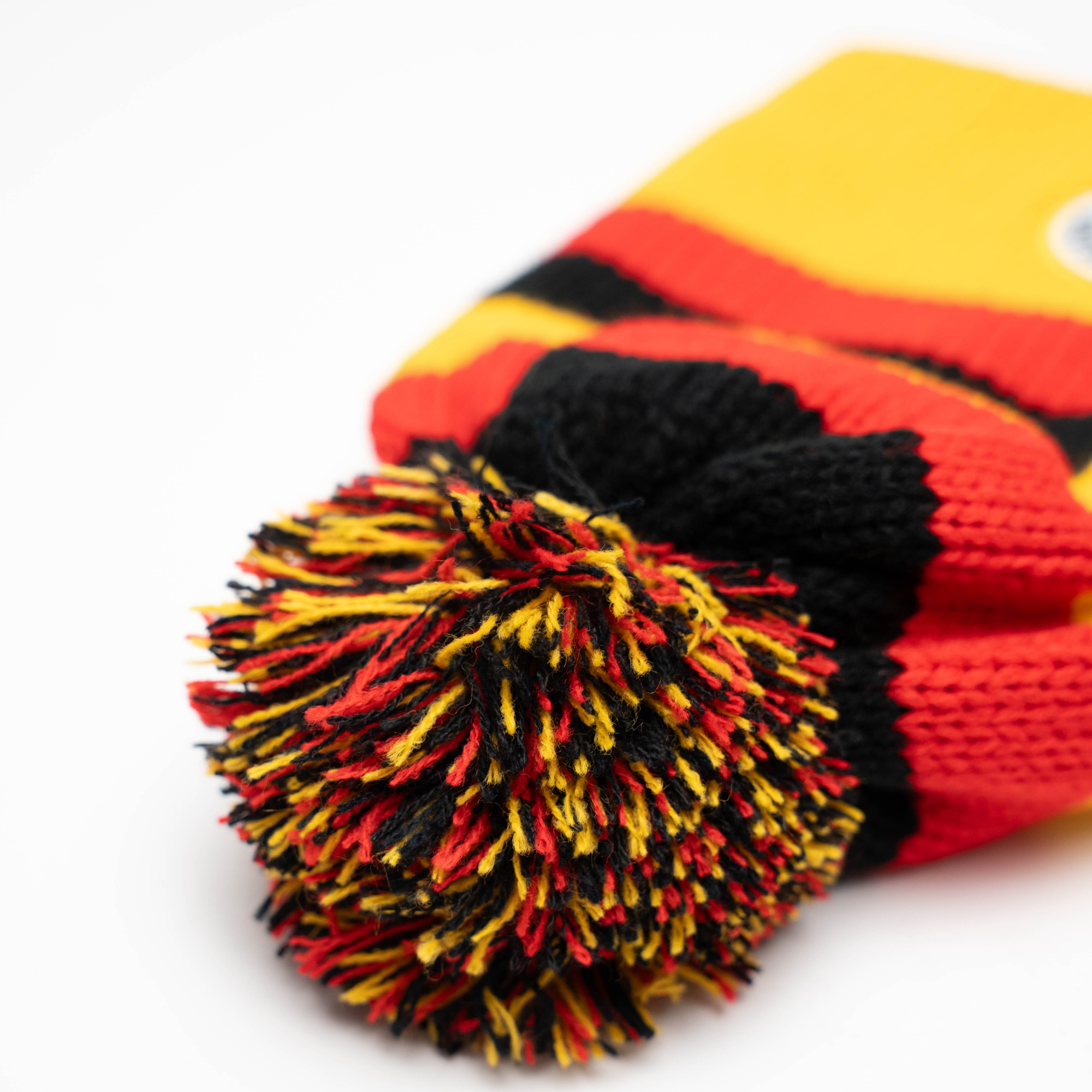 Hat black red yellow knit