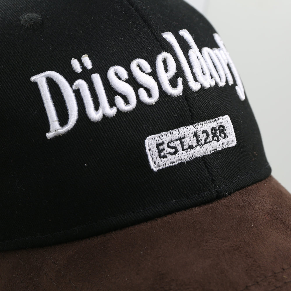 Schwarze Leder-Cap mit Düsseldorf-Motiv auf der Vorderseite – Germany Souvenir