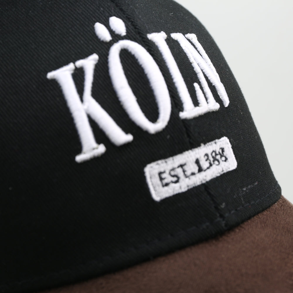 Schwarze Leder-Cap mit Köln-Motiv auf der Vorderseite – Germany Souvenir