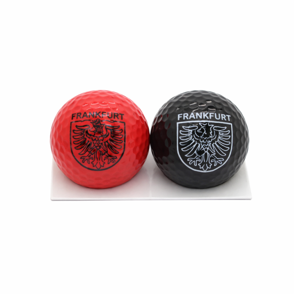 2 Golfbälle in den Farben schwarz und rot jeweils mit Frankfurt Motiv - Deutschland Souvenir